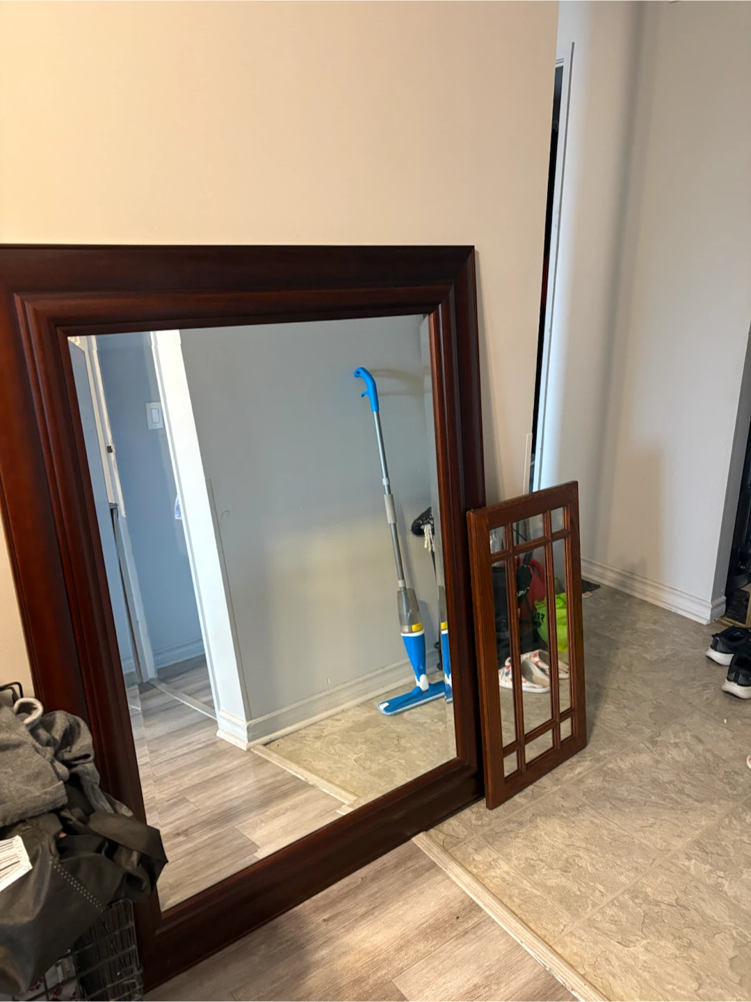 2 one small and one large Wooden Framed Mirror