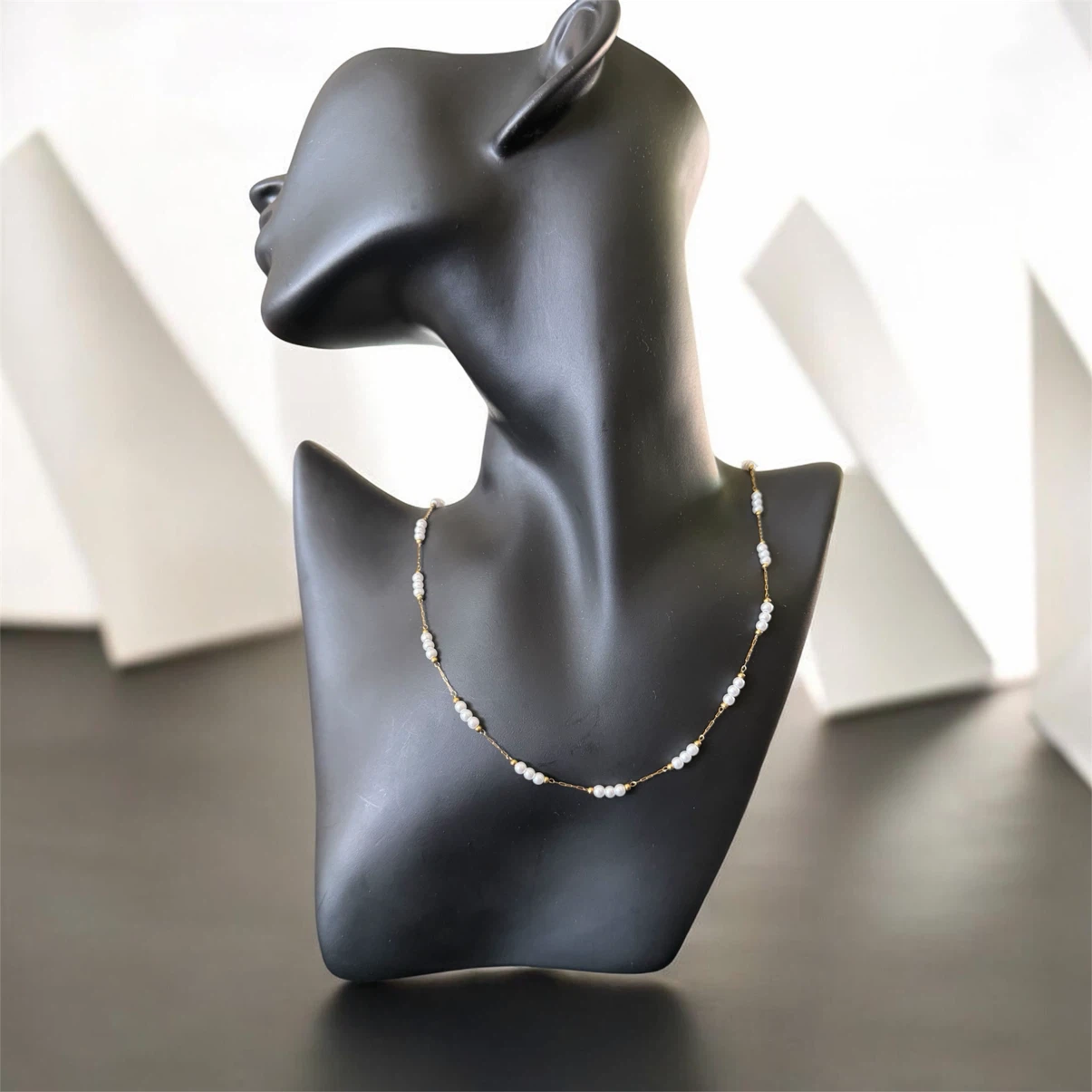 Gold-tone necklace with small pearls