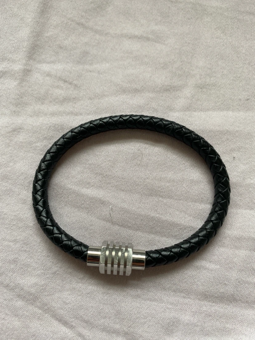 Black braided leather bracelet with silver clasp