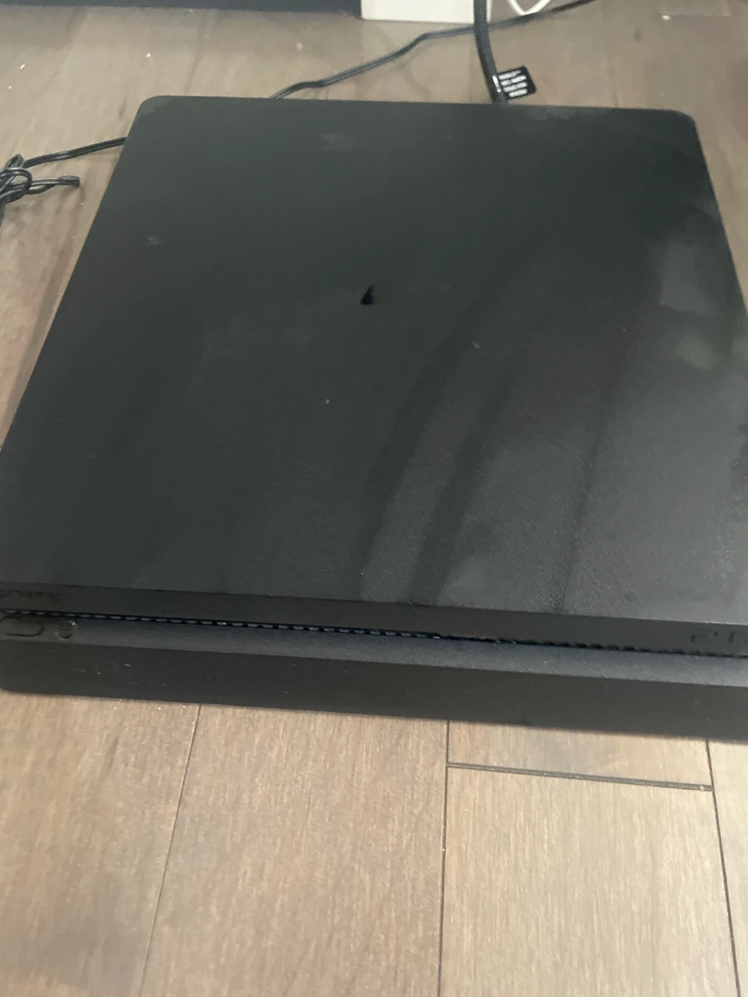 PlayStation 4 Slim Console with Two Controllers and FC 24 Game