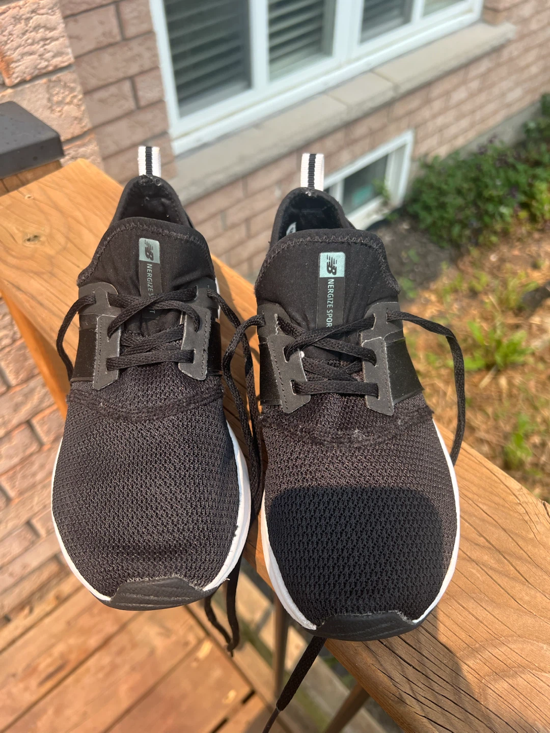 Woman’s New Balance Black Running Shoes size 7.5