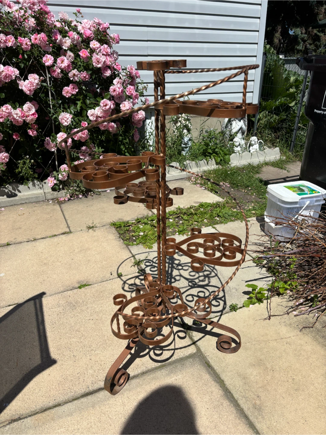Copper colored wrought spiral plant  stand