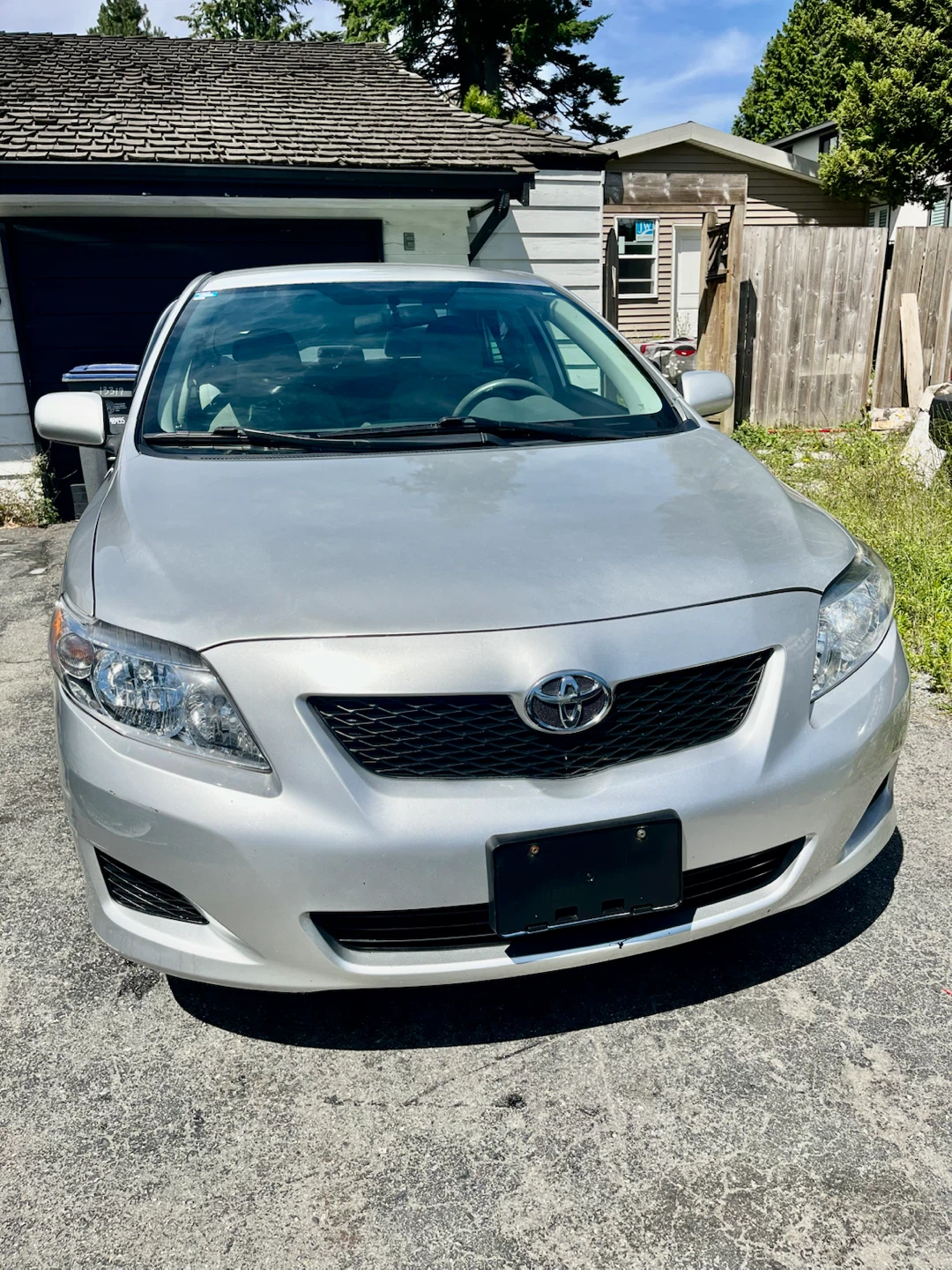 Silver Toyota Corolla Sedan