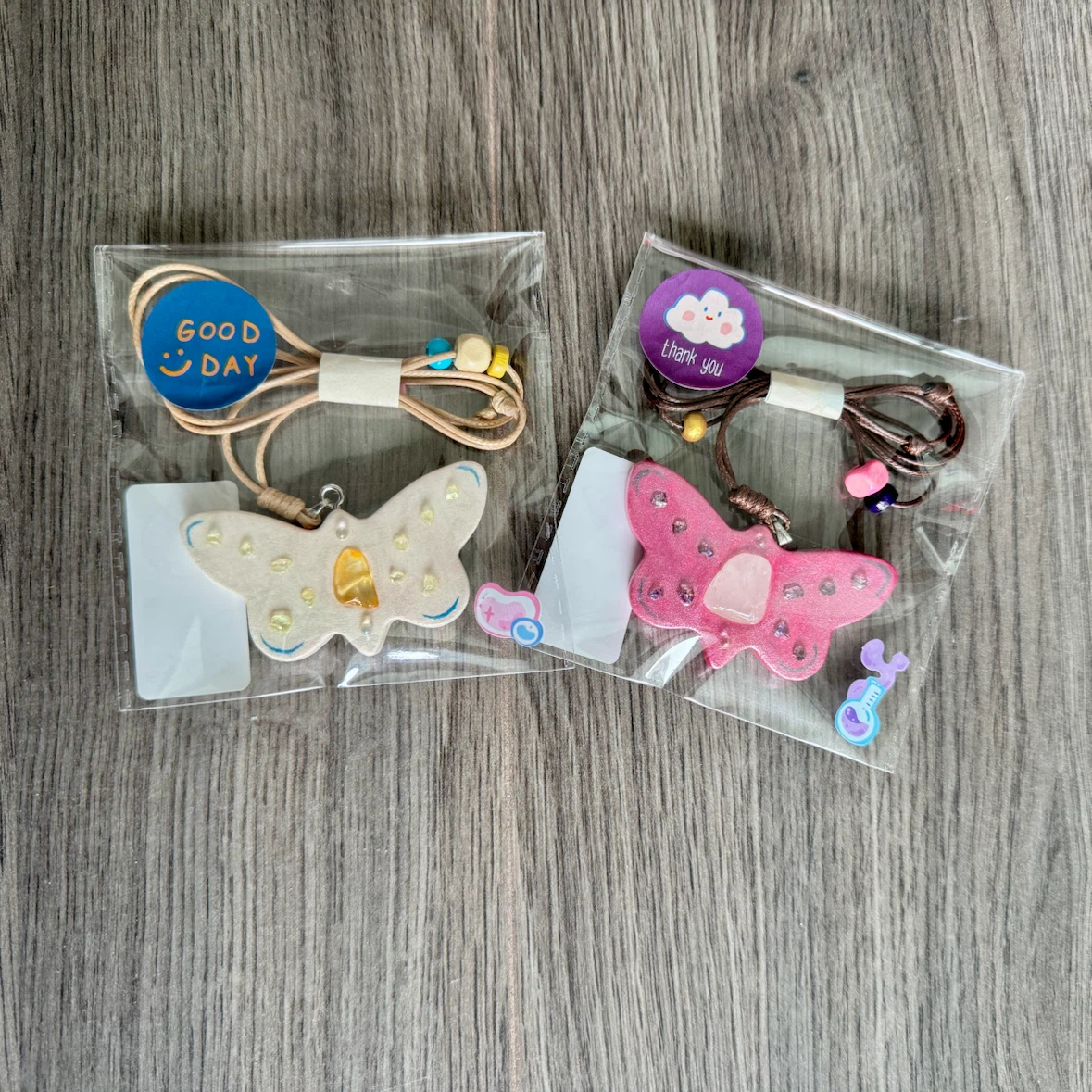 Moving sale- Butterfly clay necklaces - 2 for $8
