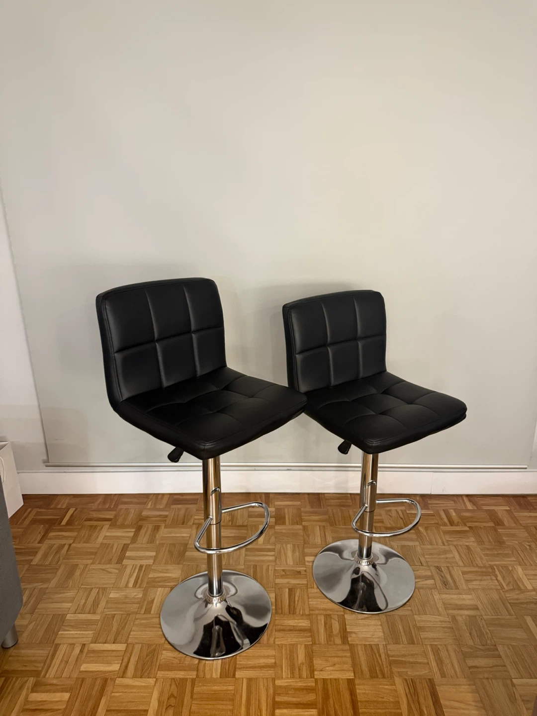 Two Bar stools (counter height) black leather material