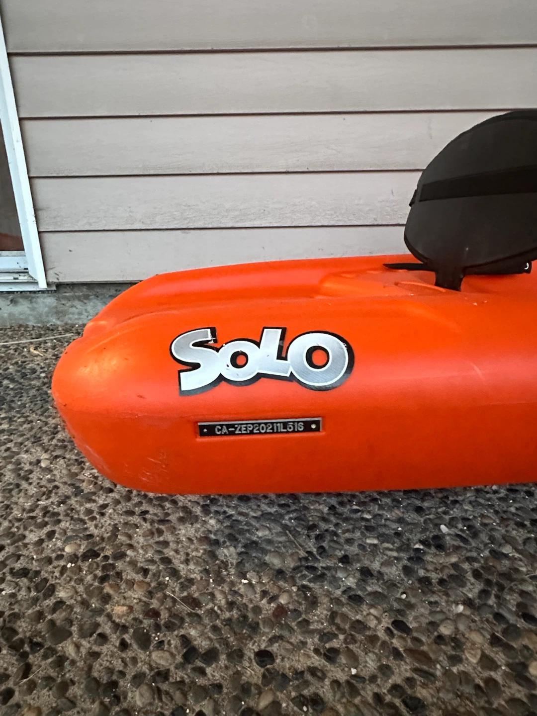 Orange Solo Kayak with Paddle