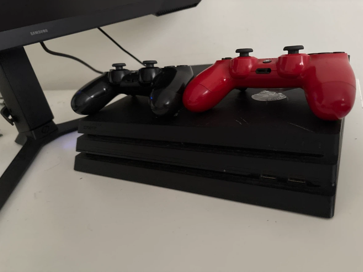 Sony PlayStation 4 Pro Console with Controllers