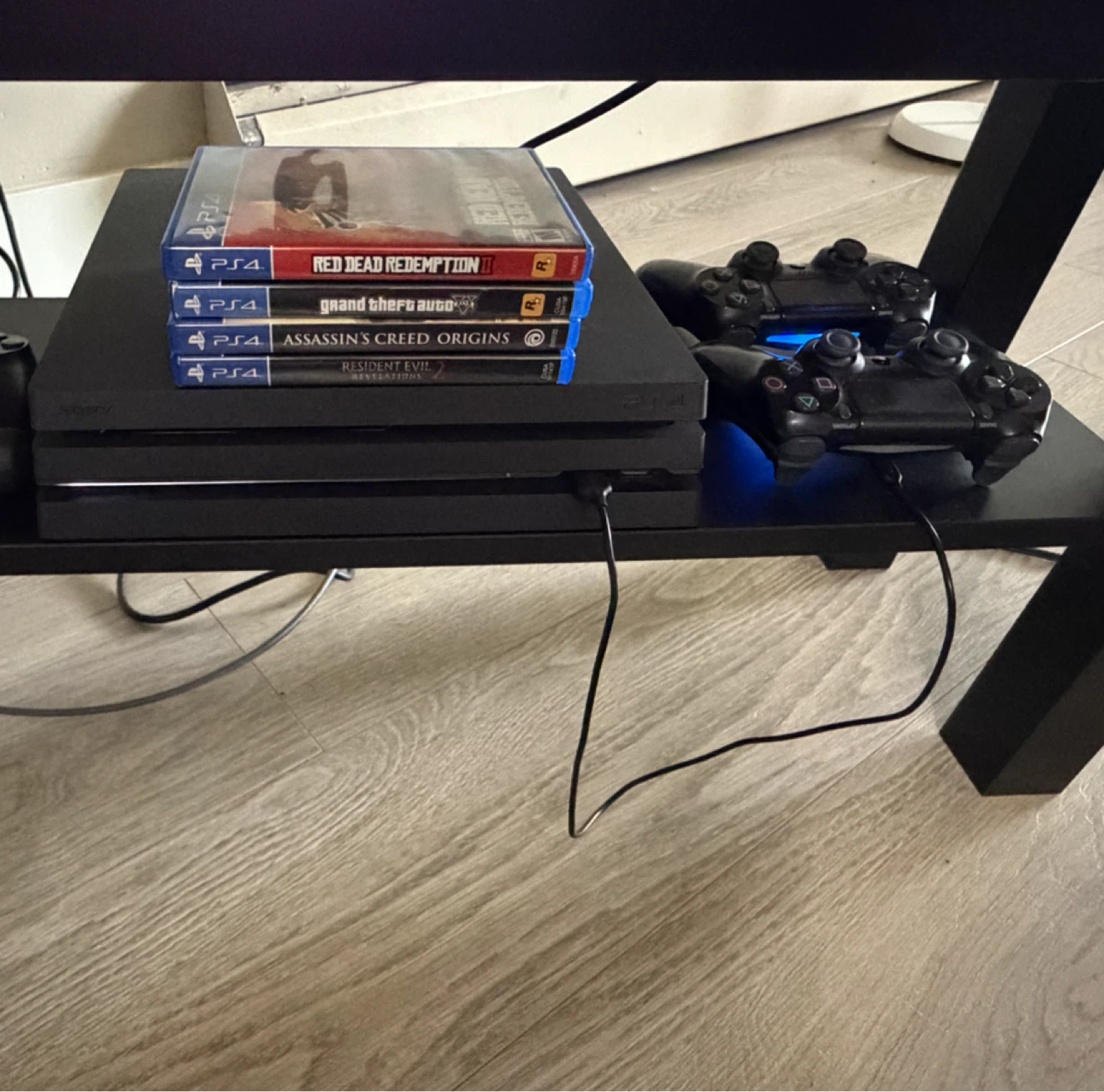 PlayStation 4 Pro Console with 2 Controllers and Games