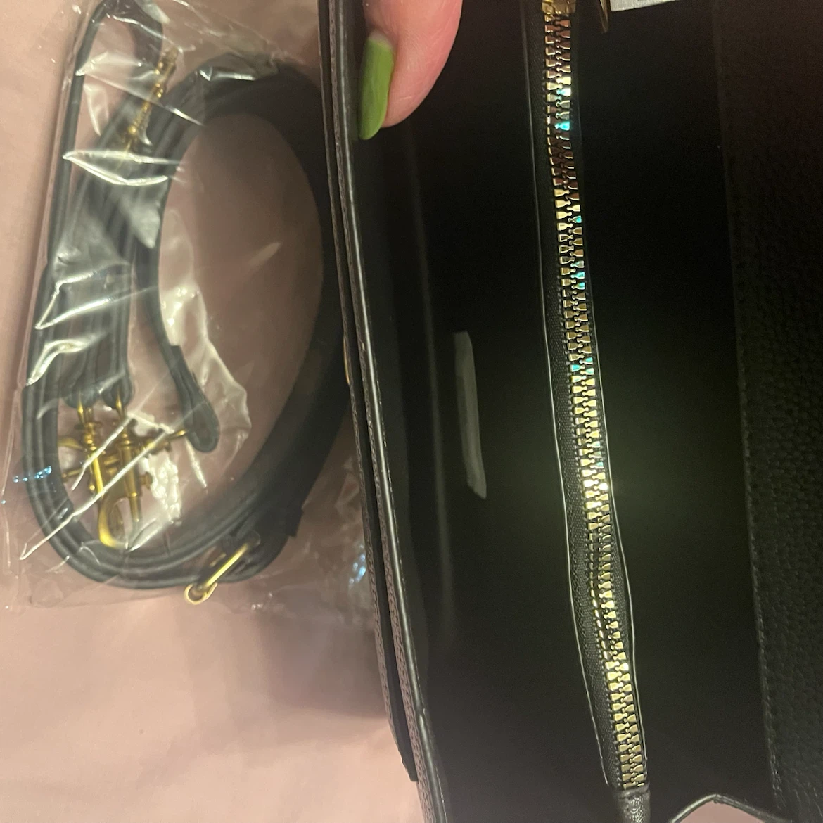 Black pebbled leather crossbody bag with teal "C" logo - photo 4