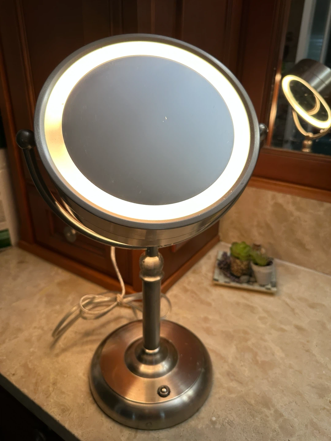 Magnifying lit Vanity Mirror