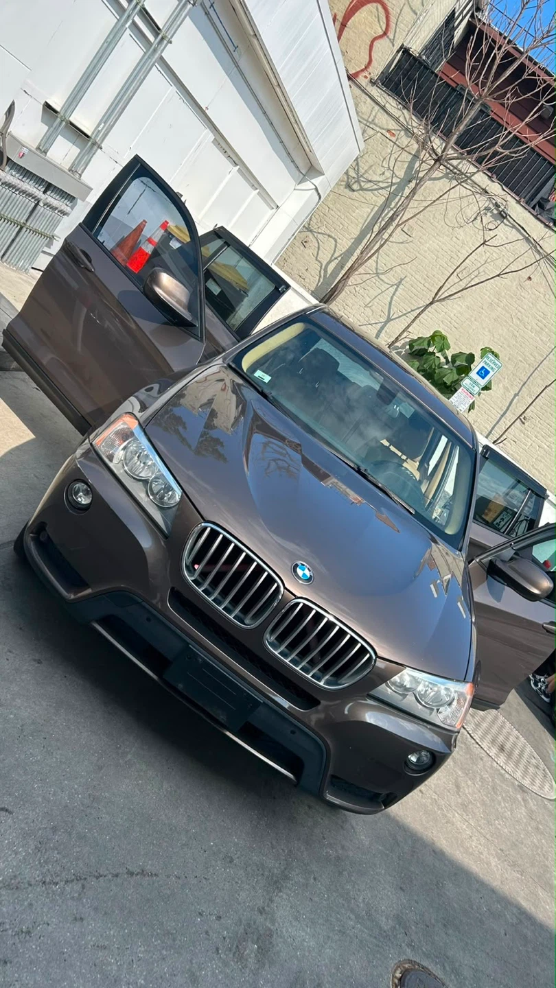 Brown BMW X3 SUV