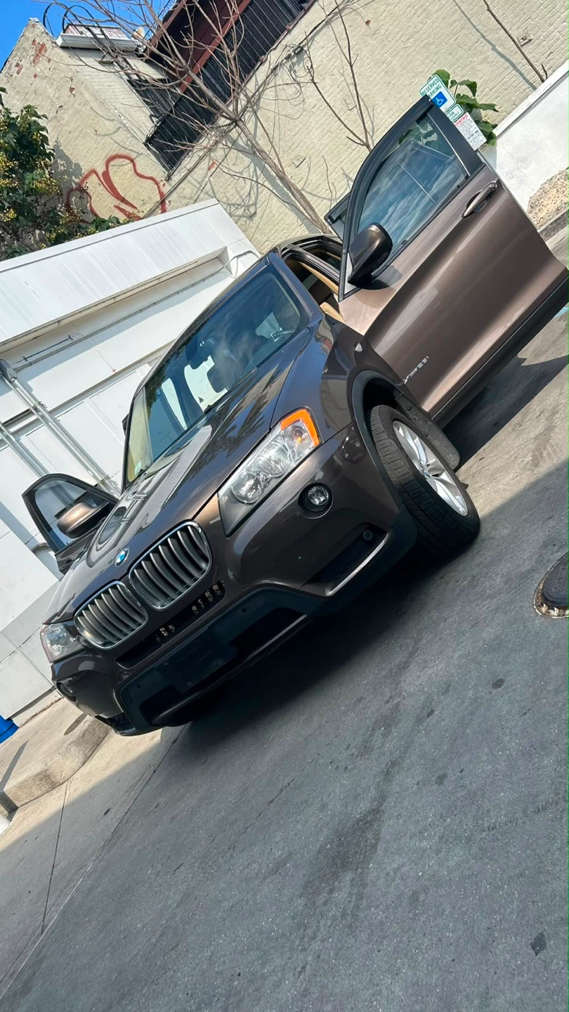 Brown BMW X3 SUV - photo 3