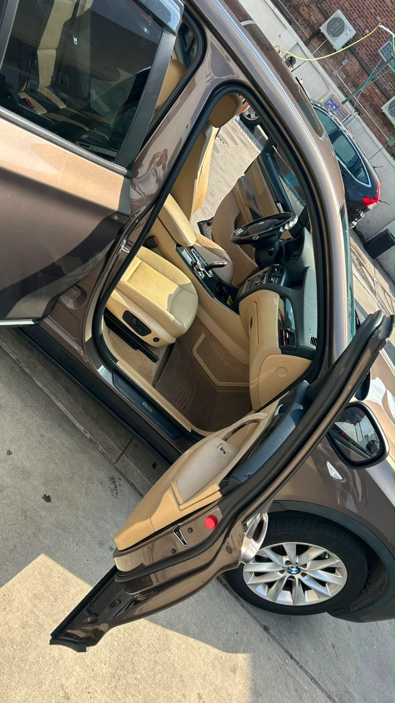 Brown BMW X3 SUV - photo 4
