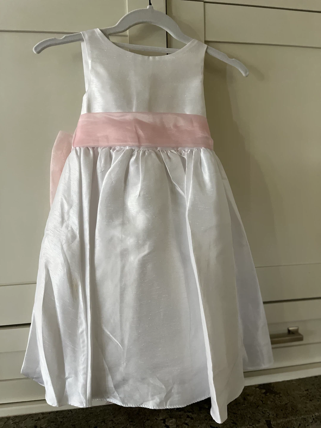 White Dress with Pink Bow and Flower Accent
