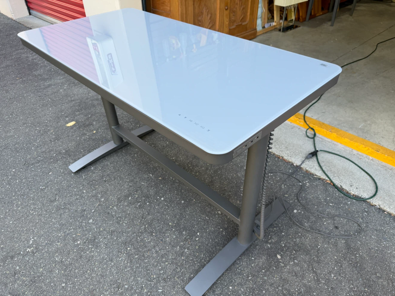 Tresanti glass top electric sit to stand desk