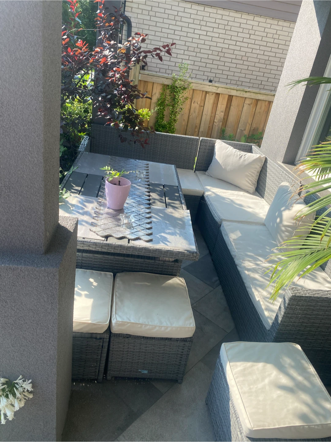 Outdoor sectional with 3 stools and dinning table