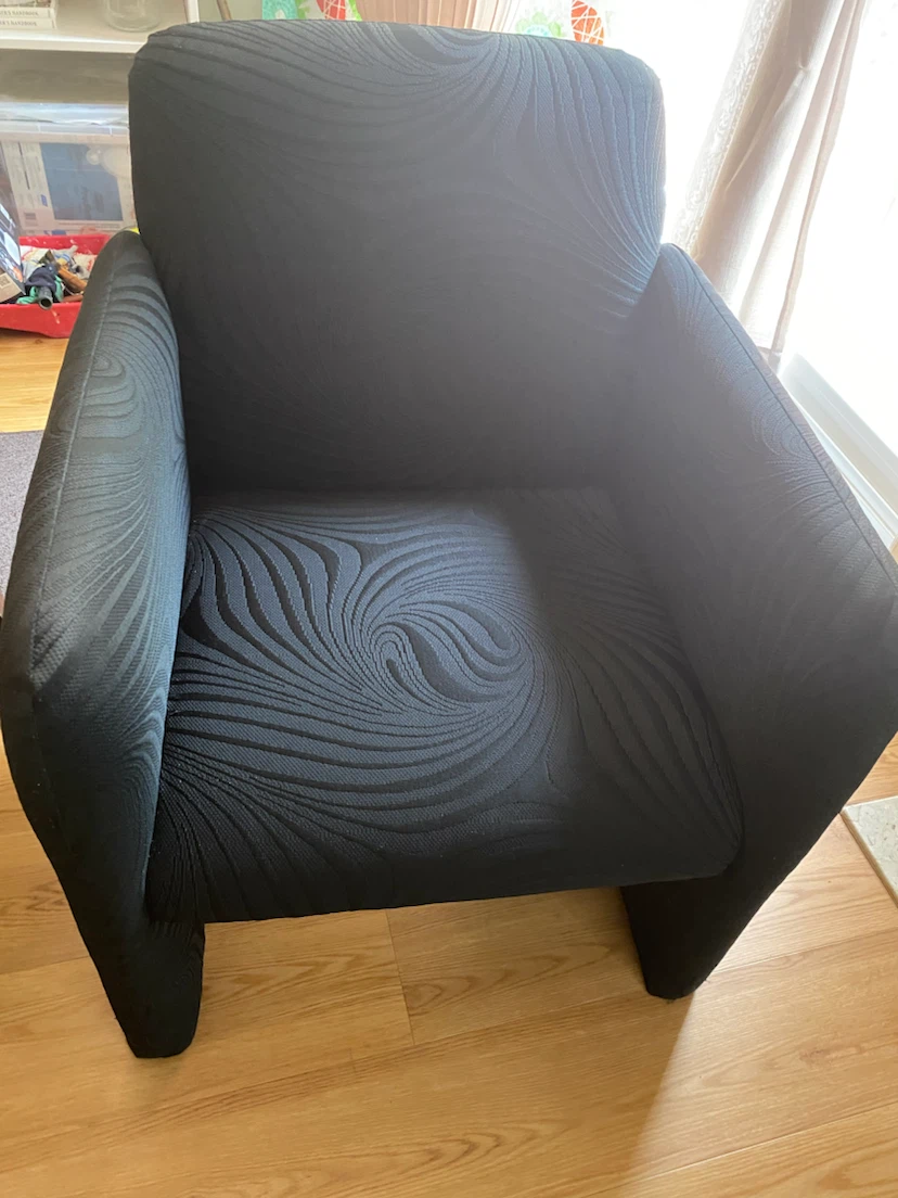 Black Armchair with Swirl Pattern