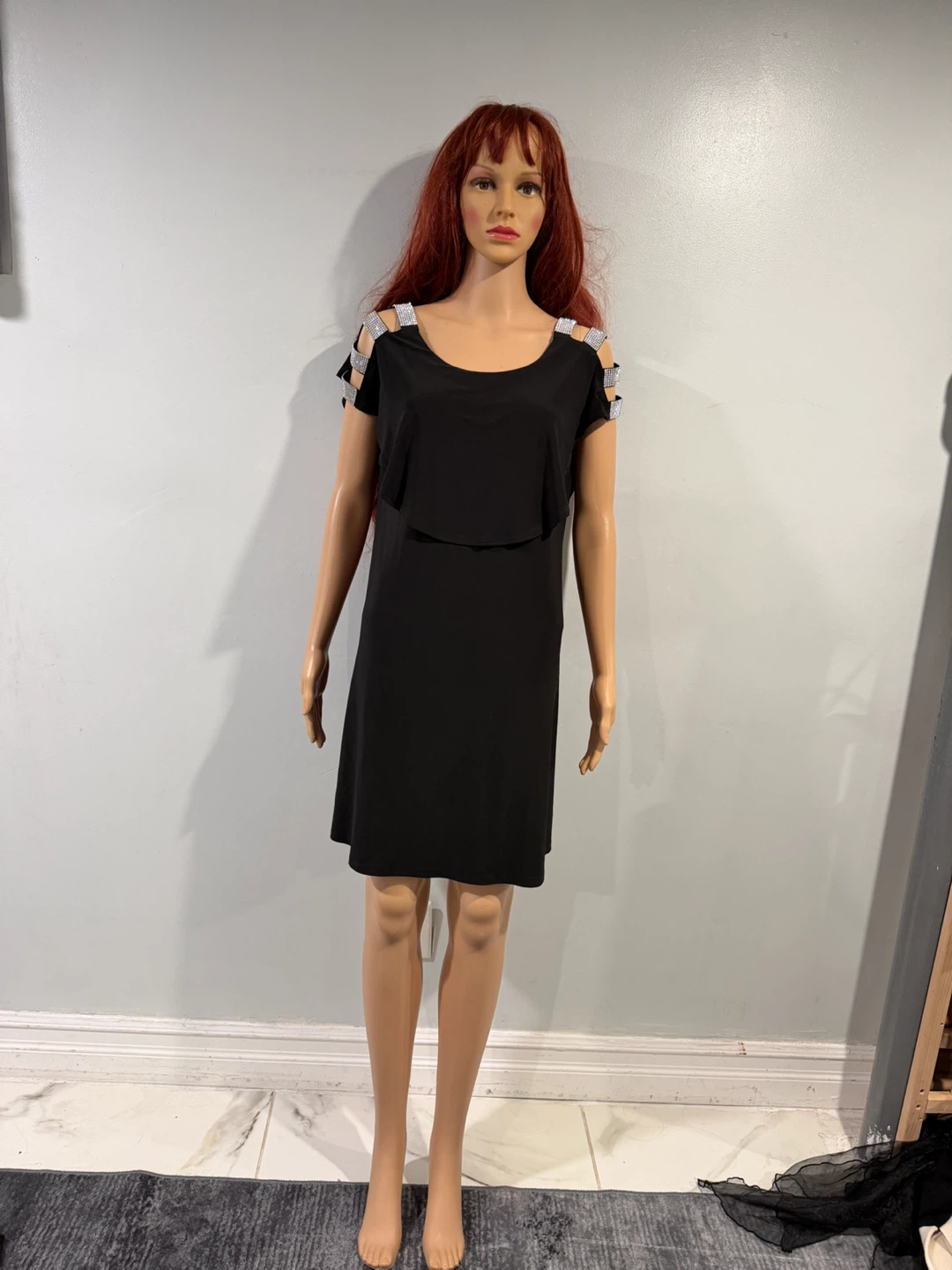 Black dress with embellished shoulders