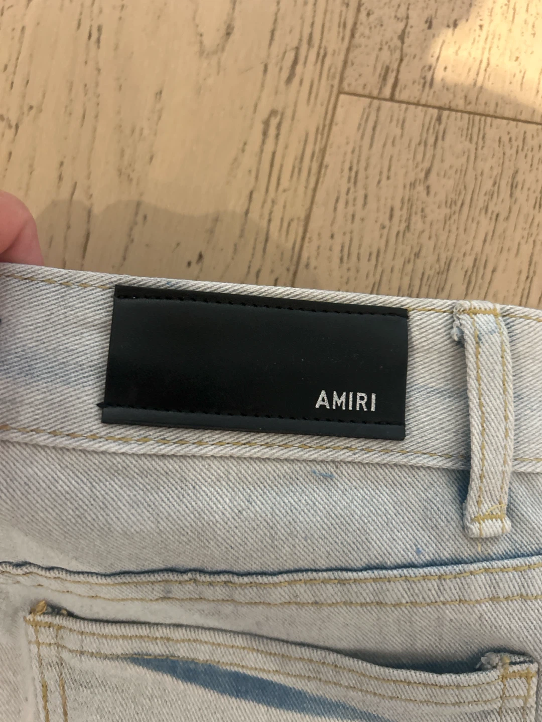 AMIRI Light Wash Distressed Jeans - photo 3