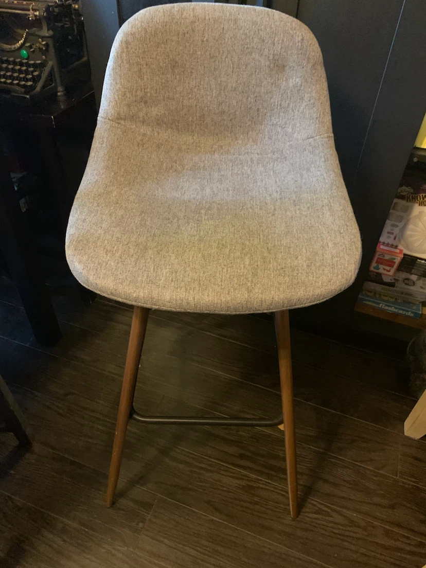 Bar stool with metal leggings
