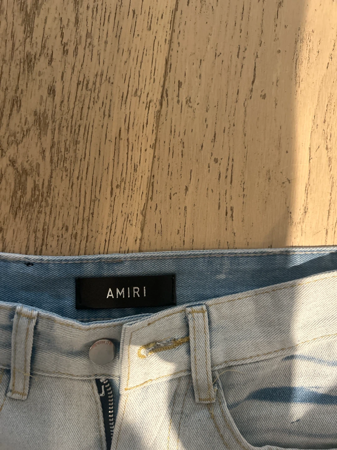 AMIRI Light Wash Distressed Jeans - photo 4