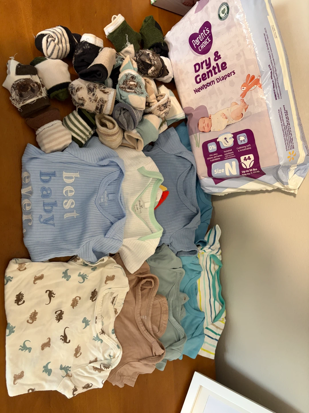 Baby Clothes and Newborn Diapers Lot