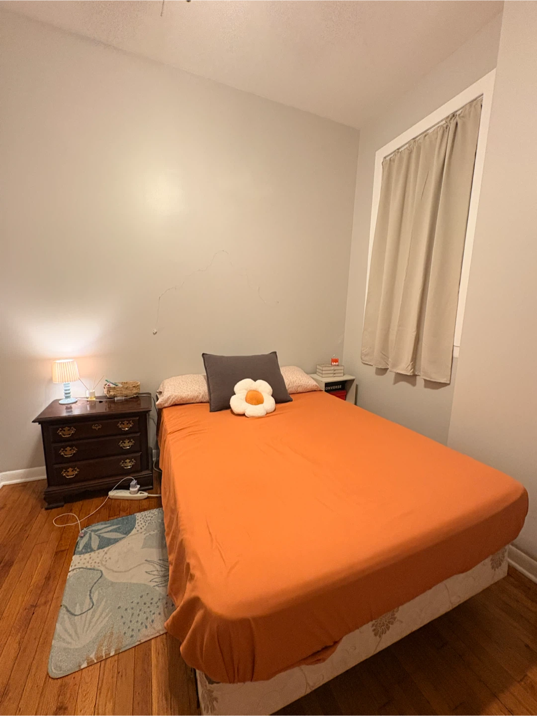 Full bed, wooden nightstand
