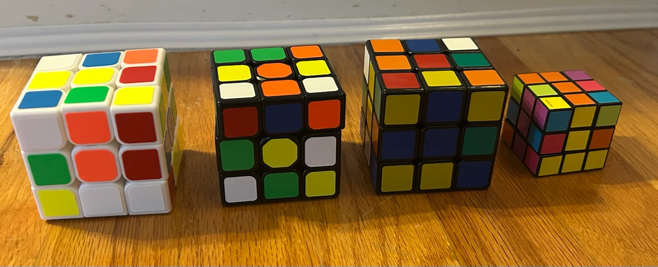 Set of 4 different twisty puzzles/cubes
