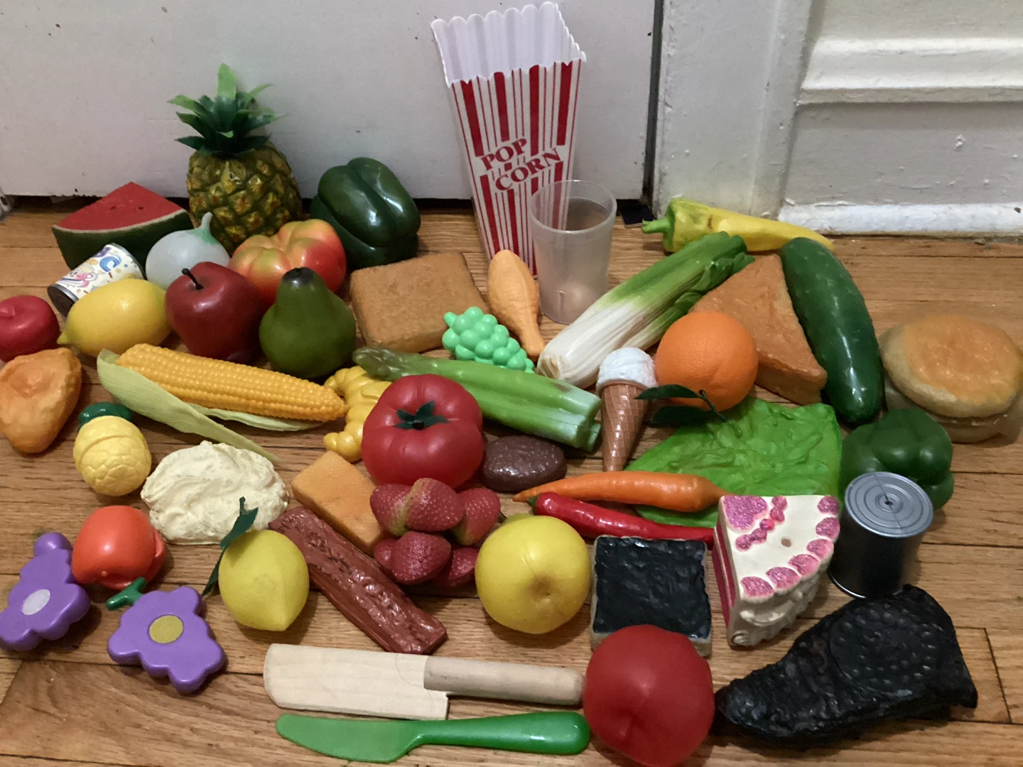 Montessori realistic-looking Play Food and some foods to cut