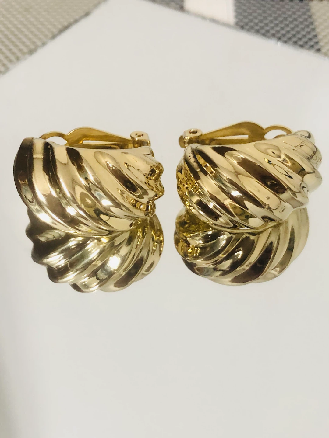 Gold Tone Swirl Clip-On Hoop Earrings