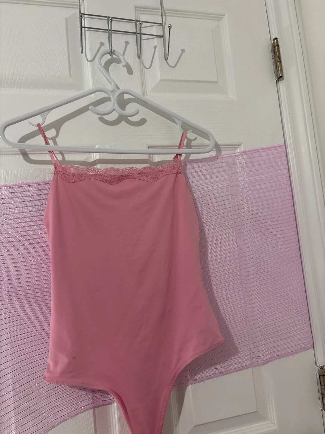 Pink lace trim camisole bodysuit