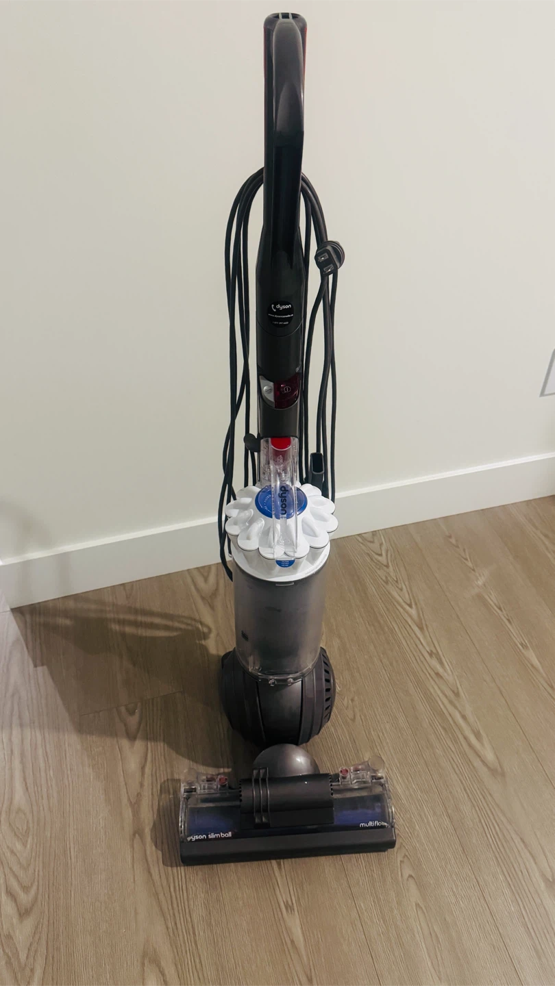 Moving Dyson slim ball multifloor vacuum