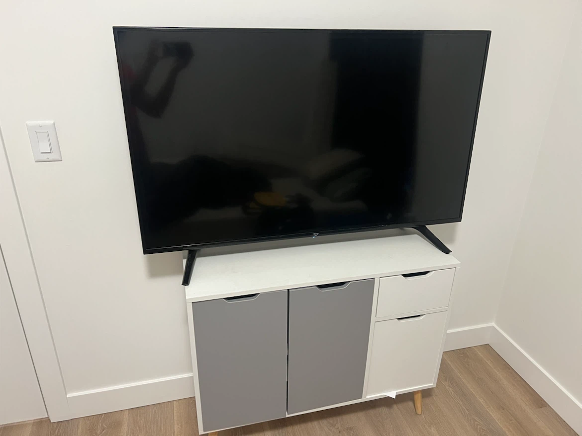 A1 Fire 50inch TV with storage cabinet