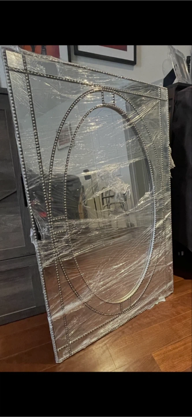 Decorative mirror excellent condition.  28x44.5 inches