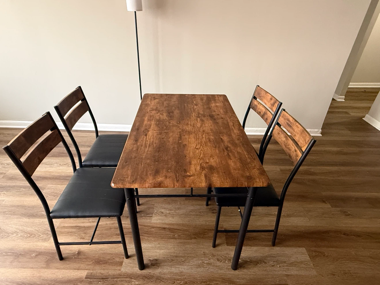 4-Piece Dining Set with Wooden Table and Black Chairs