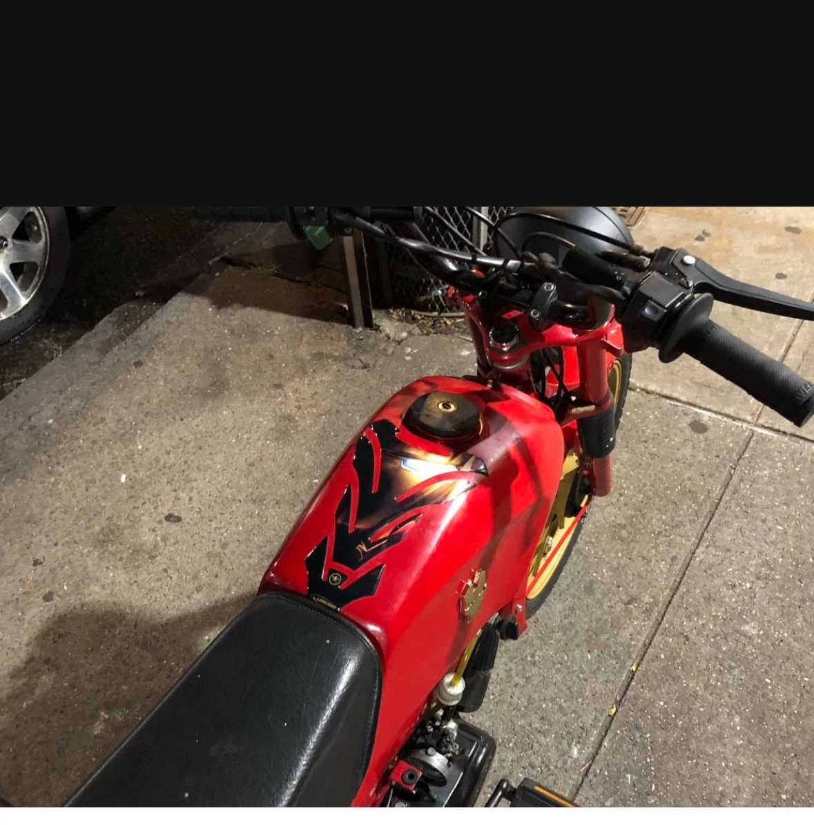 Red Moped with Gold Wheels