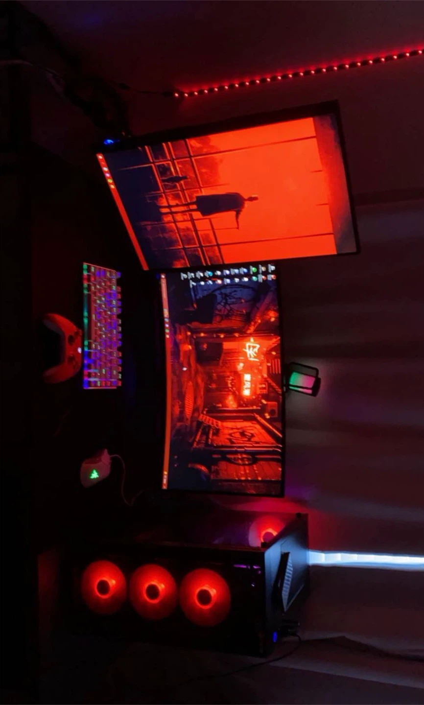Gaming PC Setup with Dual Monitors, Keyboard, and Mouse