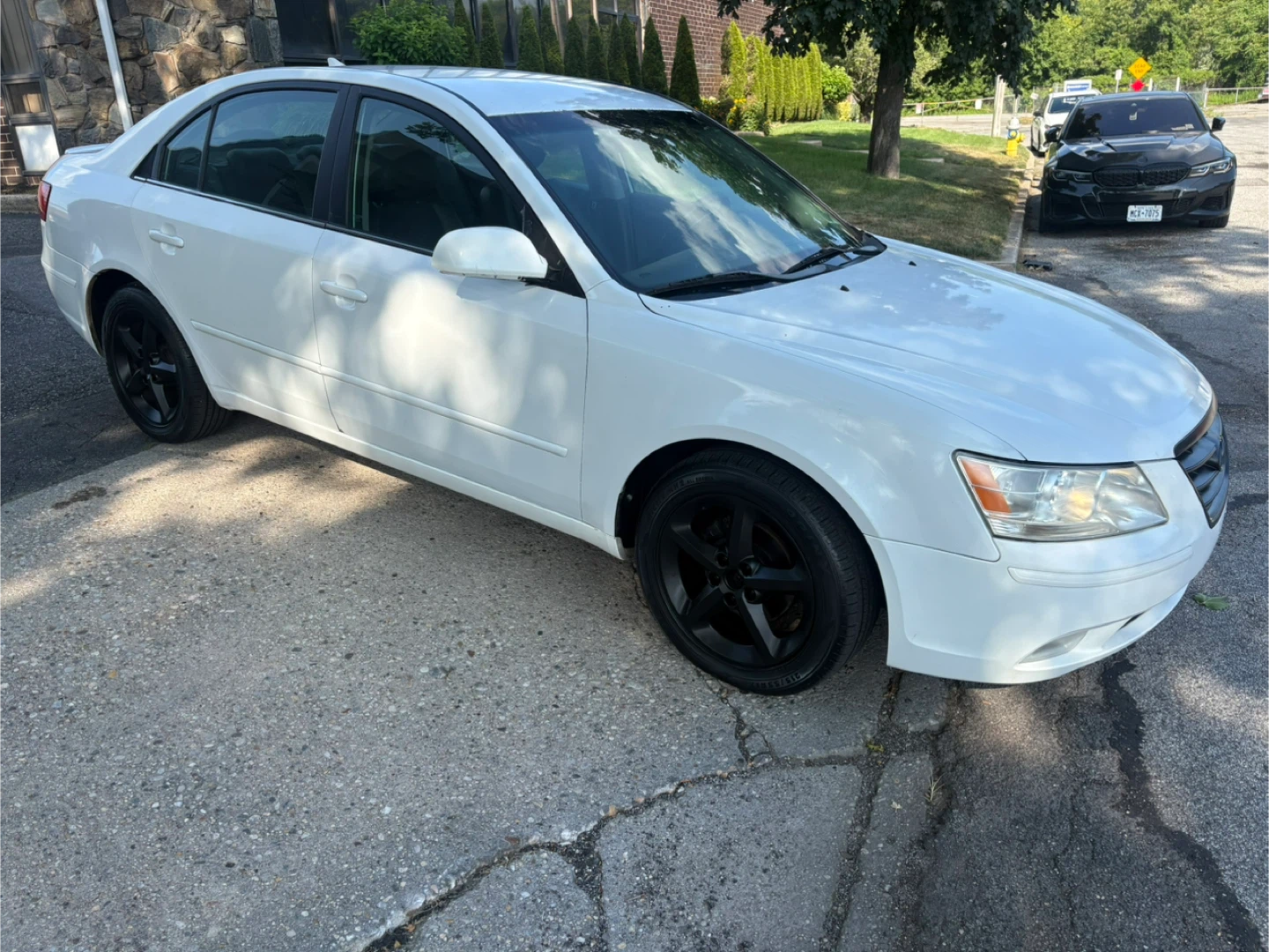 White Hyundai Sonata Sedan. $2700