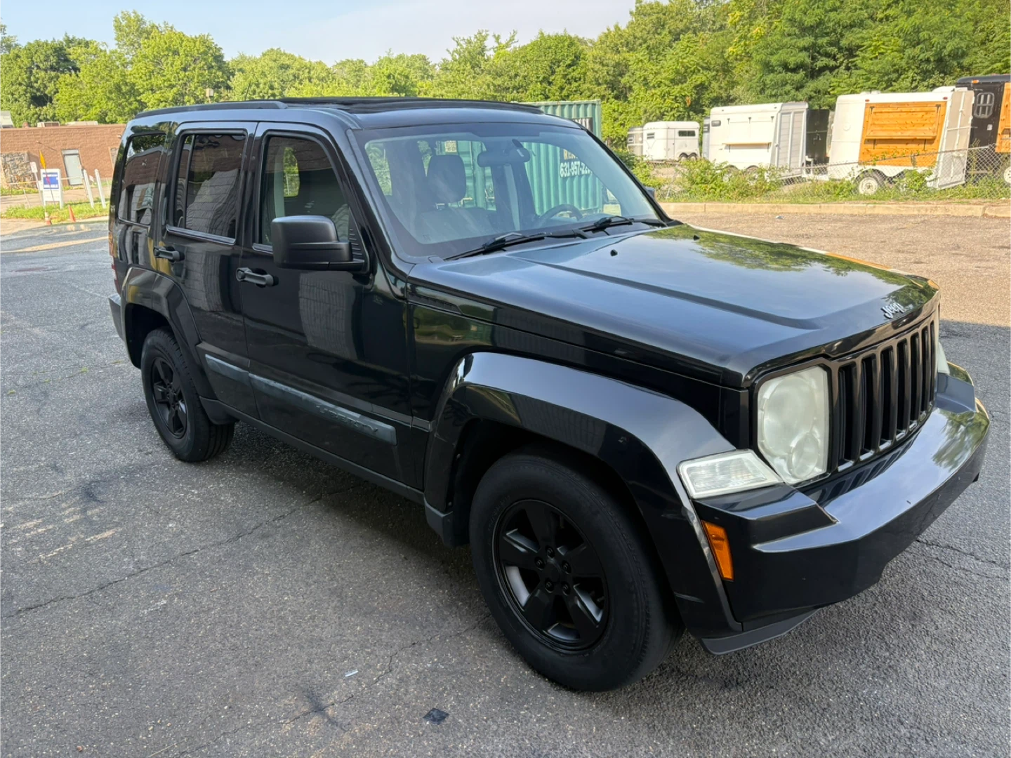 Black Jeep Liberty SUV 2800