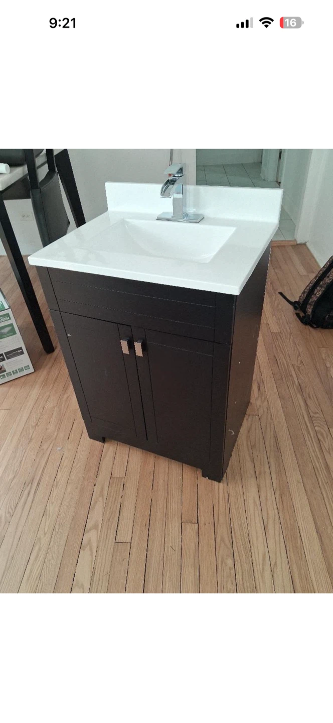 Dark Brown Vanity with White Sink and Faucet