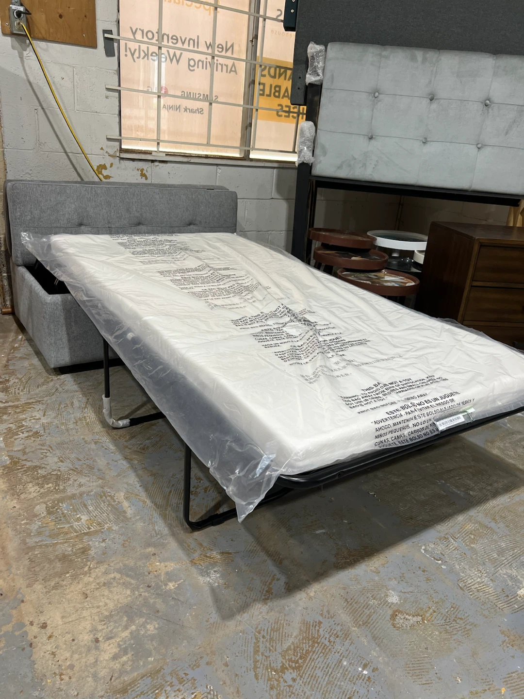 Sleeper Ottoman Grey Fabric with casters