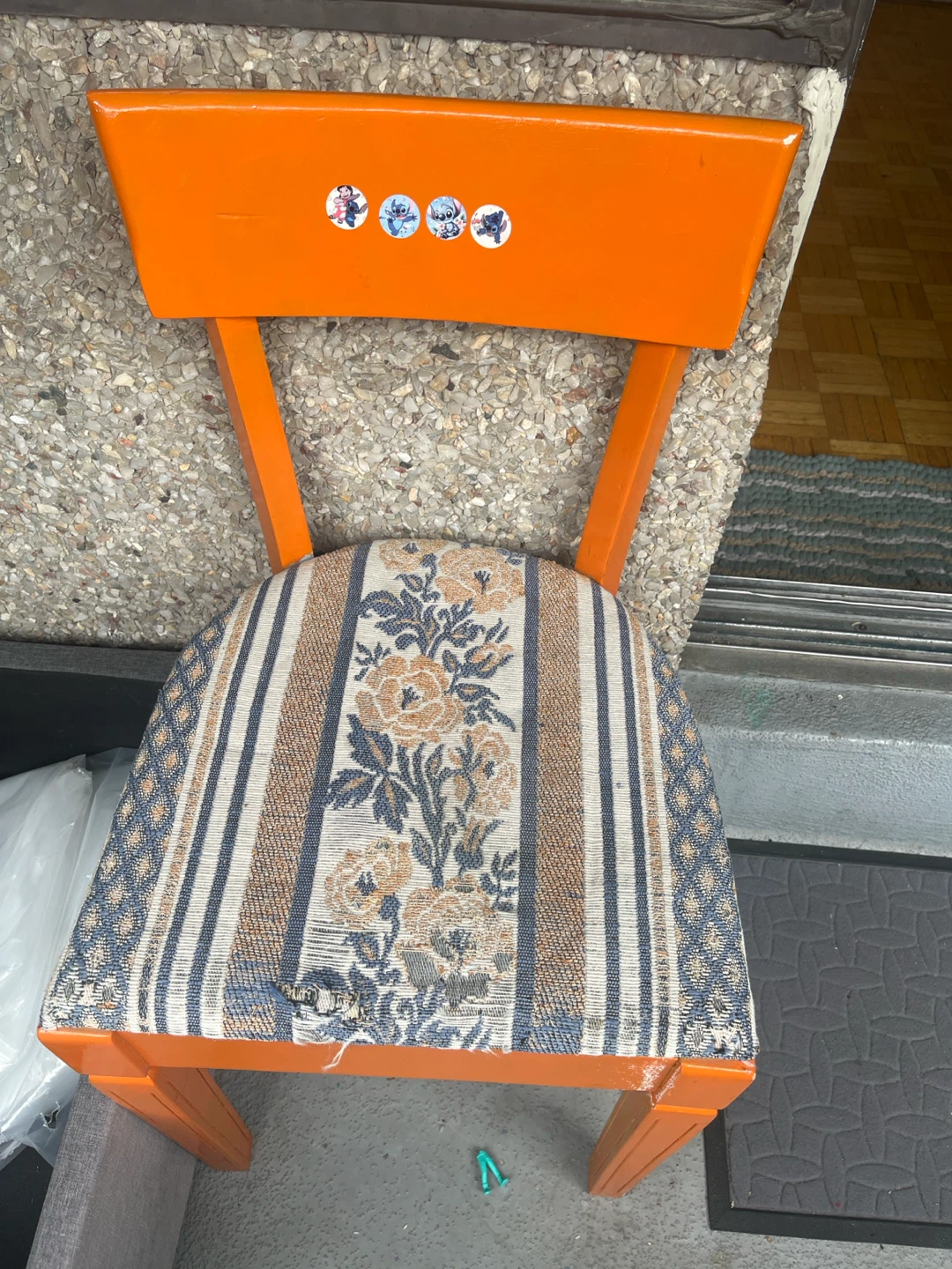 Orange Accent Chair with Floral Upholstery