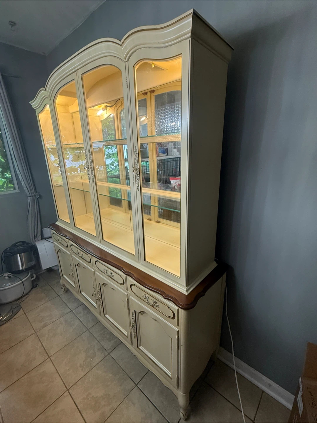 Coquette Aesthetic-Cream coloured china cabinet with glass doors