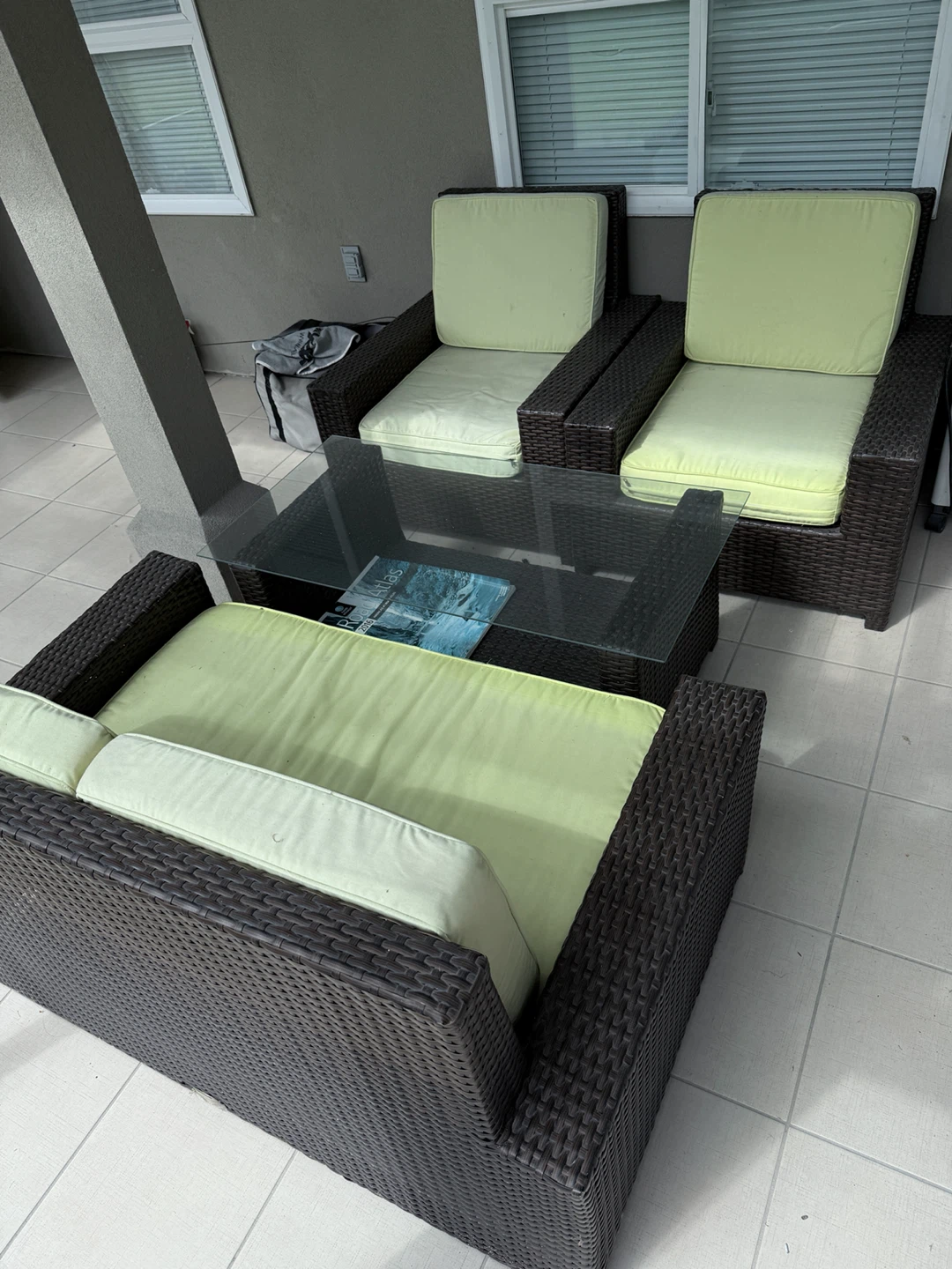 Wicker Outdoor Sofa with Light Green Cushions
