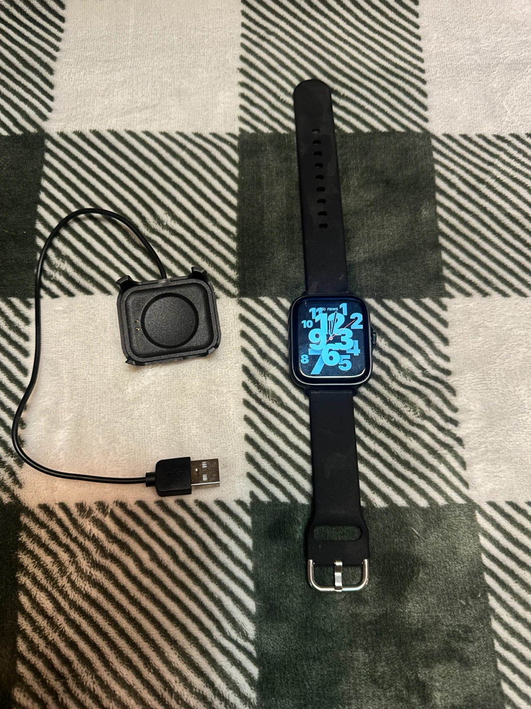 Black Smartwatch with Charger