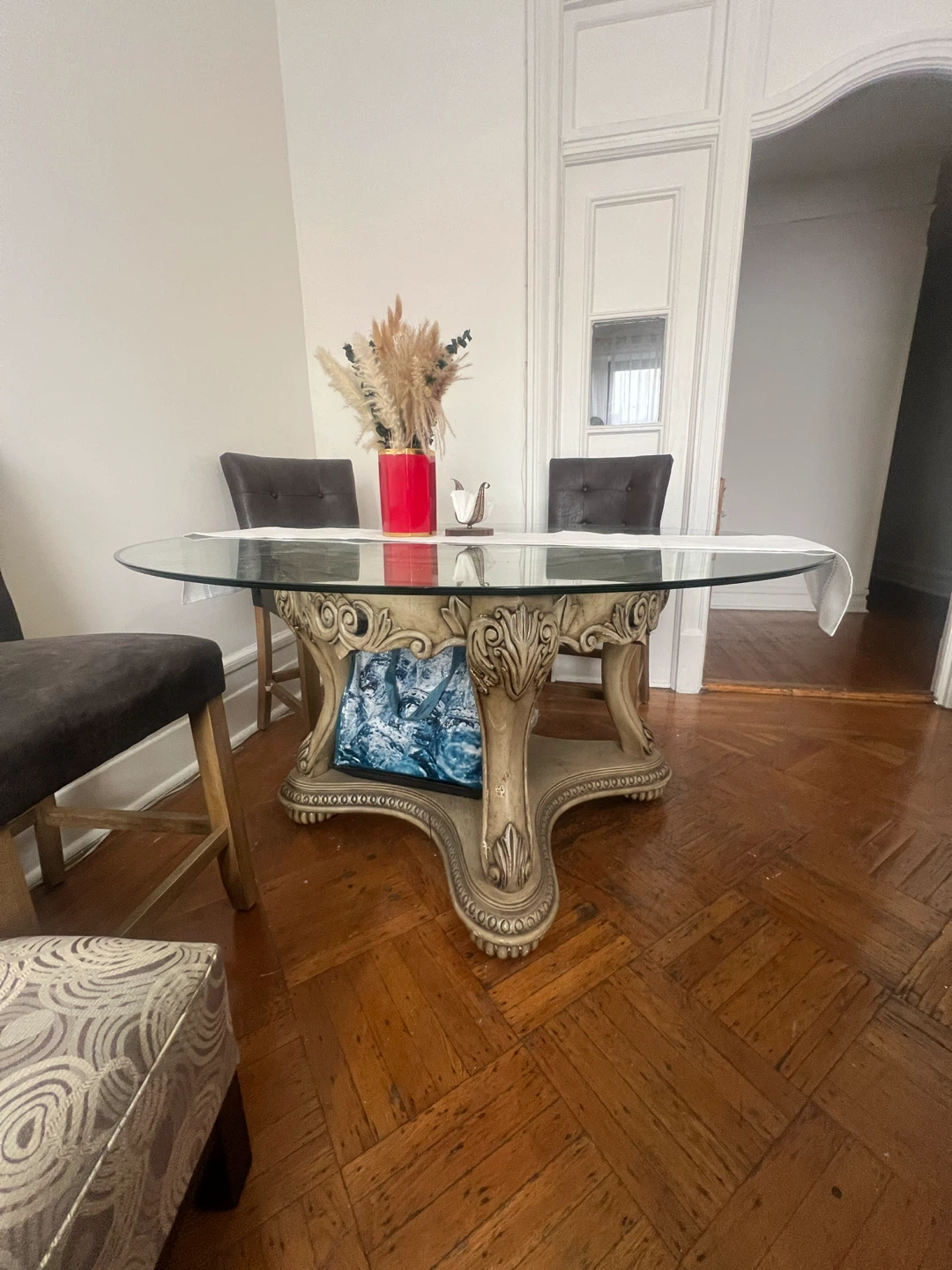 Round Glass Top Dining Table with Ornate Base