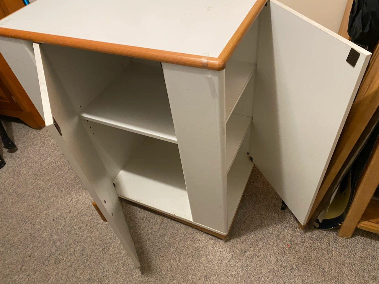 White storage cabinet with wood trim - photo 3