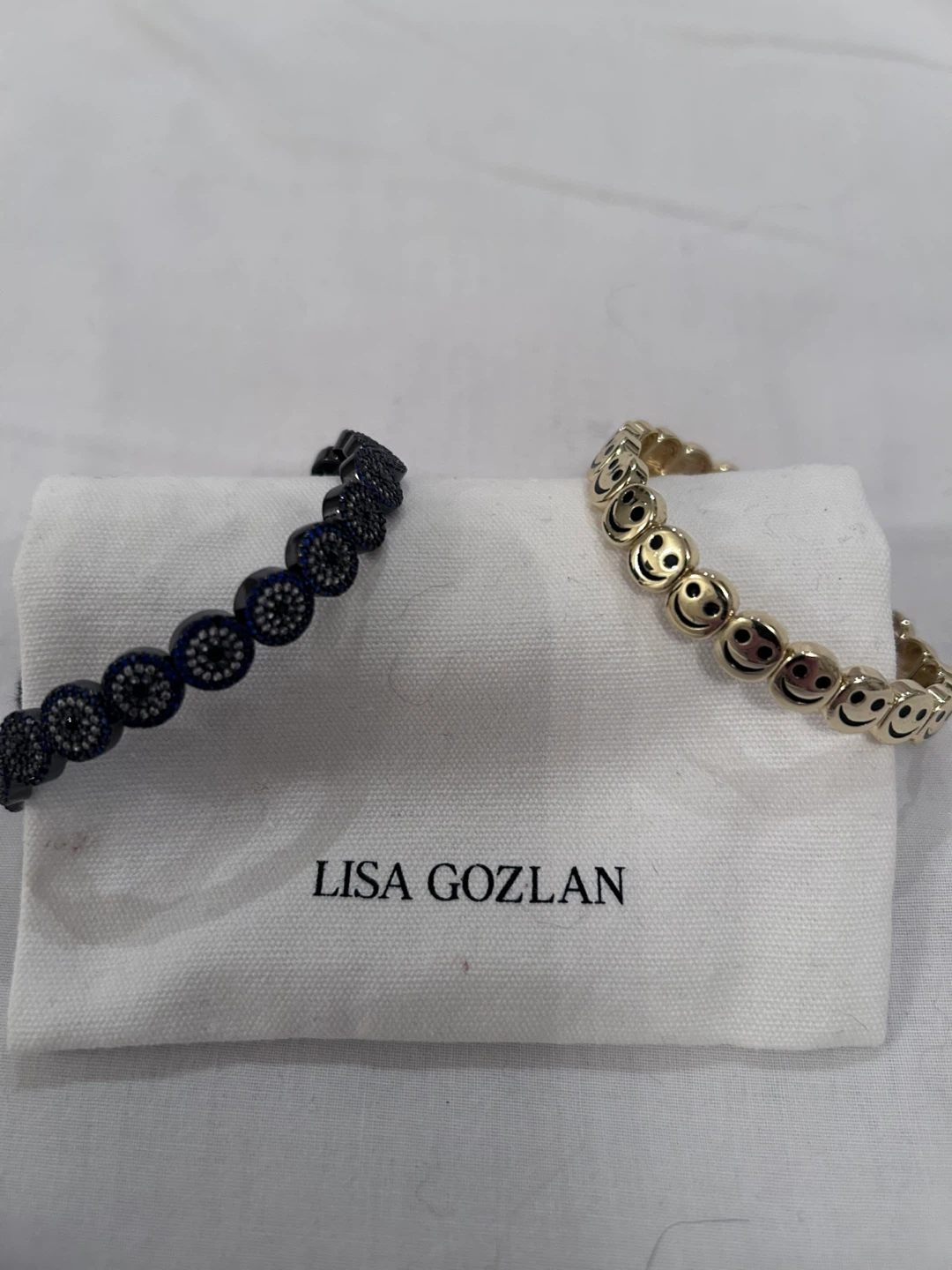 Lisa Gozlan Bracelets - Gold Smiley Face & Black Stone