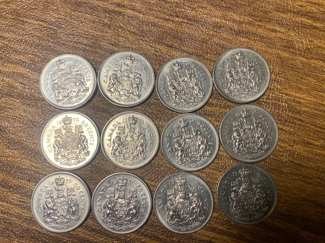 Collection of 12 Canada 50 Cent Coins