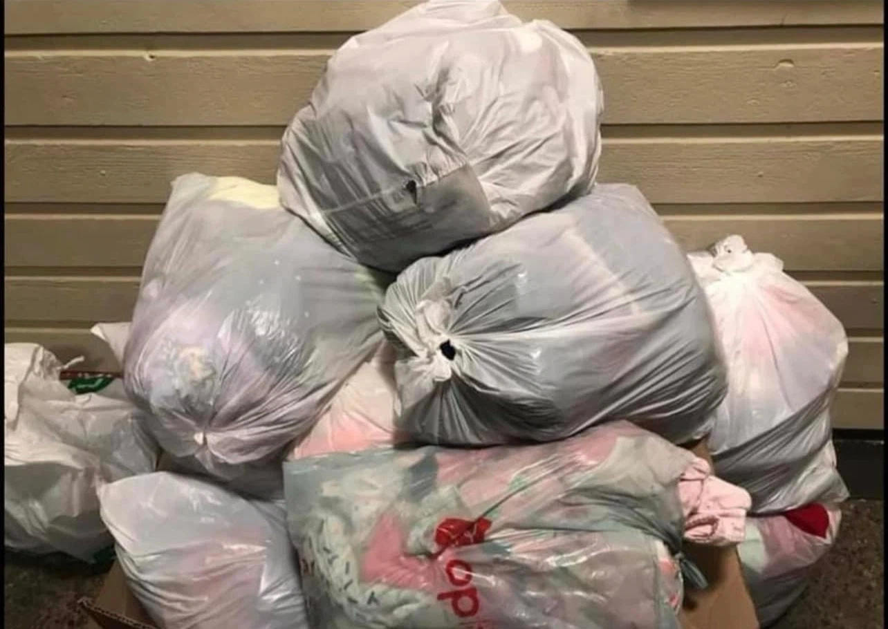 Bag of assorted clothing items
